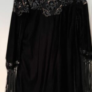 Elegant Black Dress with Intricate Detailing